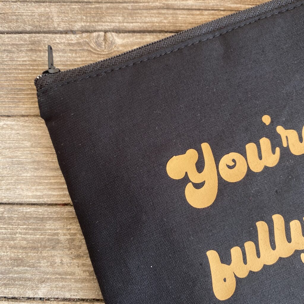 You´re never fully dressed without a smile - Tasche mit goldbrauner Schrift